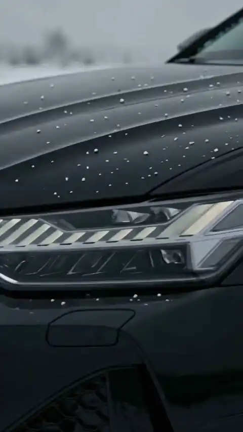 Luxusauto Winter - Bewegtes Wallpaper