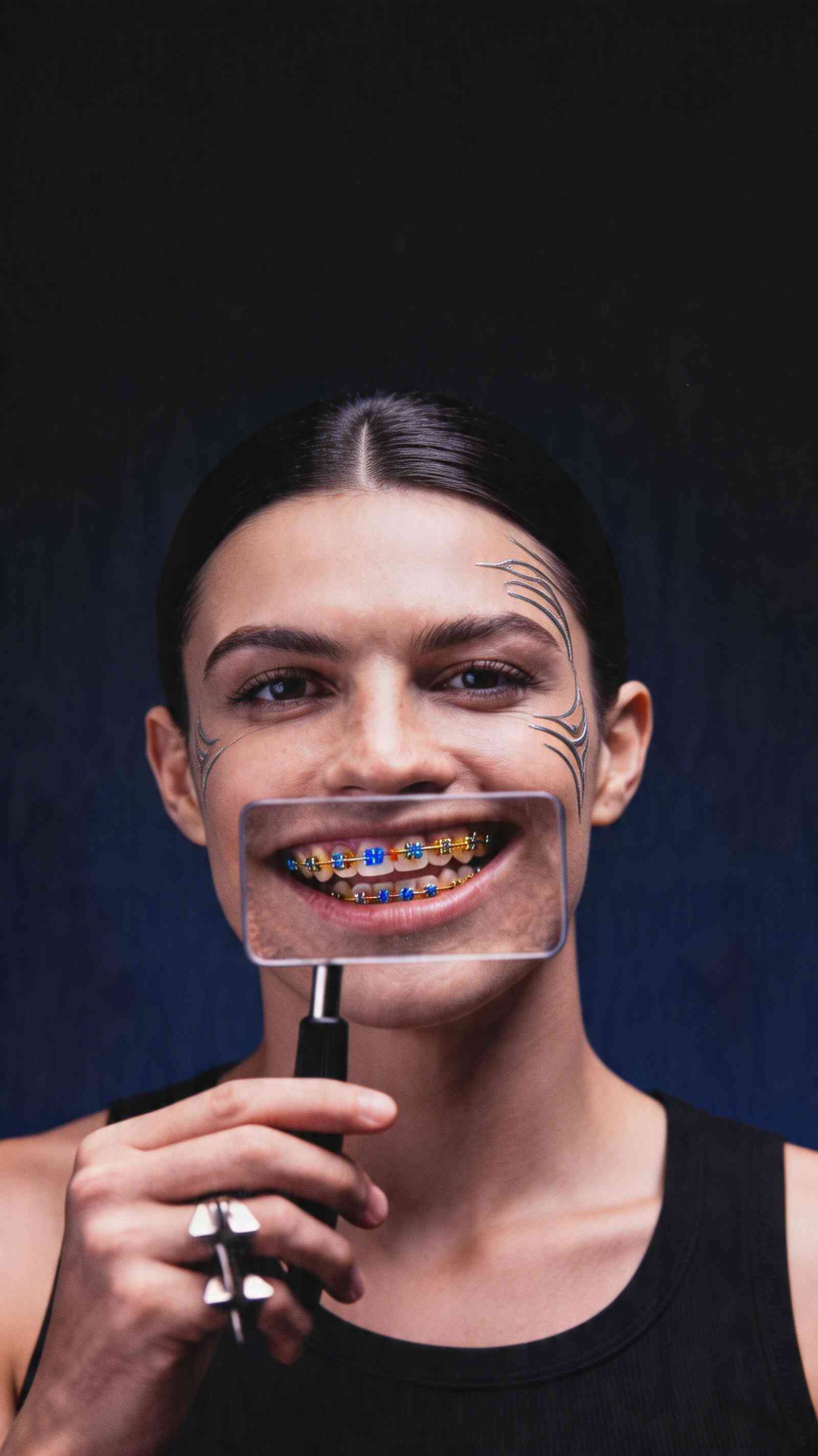 Artistic Portrait: Colorful Braces & Magnifying Glass Wallpaper