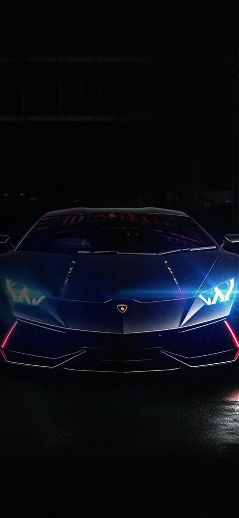 暗闇で青いLEDライトが光る黒のランボルギーニ・ウラカンのフロントビュー。