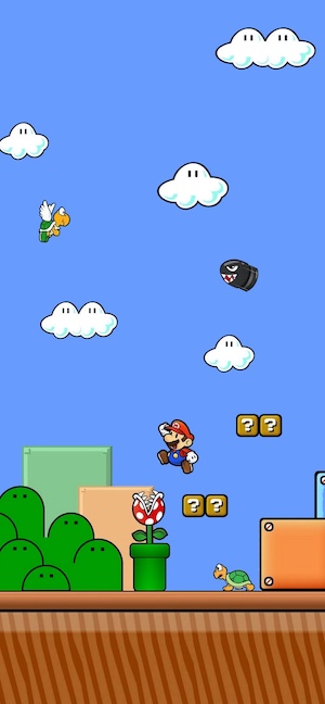 A colorful 2D Super Mario game scene featuring Mario jumping between question blocks, a Piranha Plant in a pipe, and enemies like Bullet Bill and Koopa Troopa under a bright blue sky.